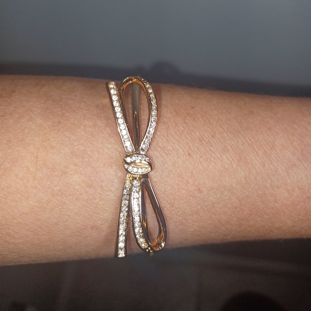 White Crystal Gold Tone Bow Slide Bracelet